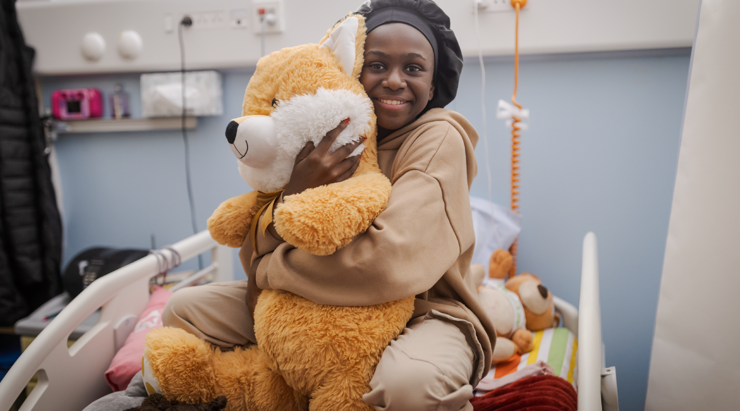 Un père avec son enfant à l'IMFE de Kaboul